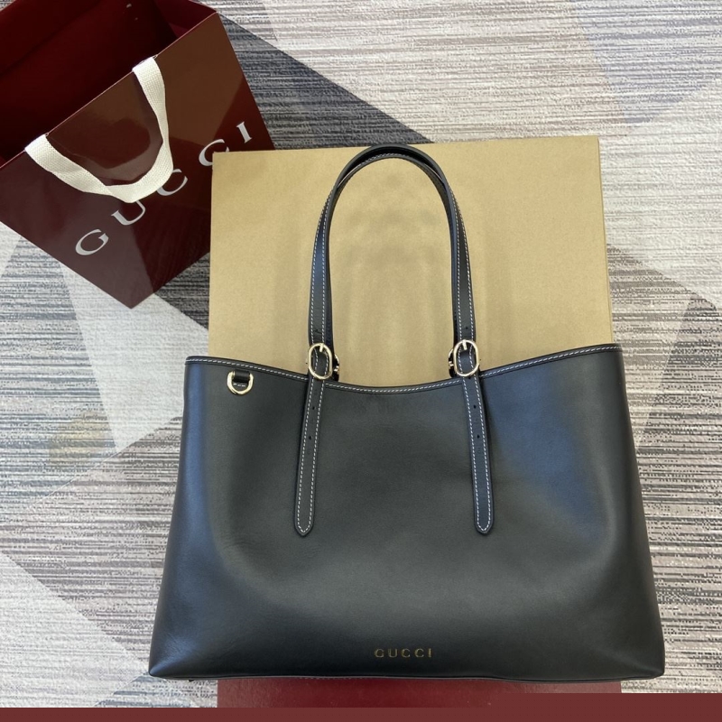 G*u*i shopping bags